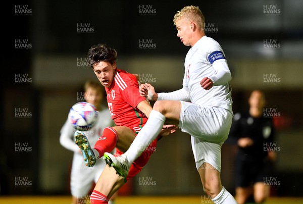 201123 - Wales U21 v Denmark U21 - European Under-21 Championship 2025 Qualifier - Christopher Popov of Wales is tackled by Oliver Nielsen of Denmark