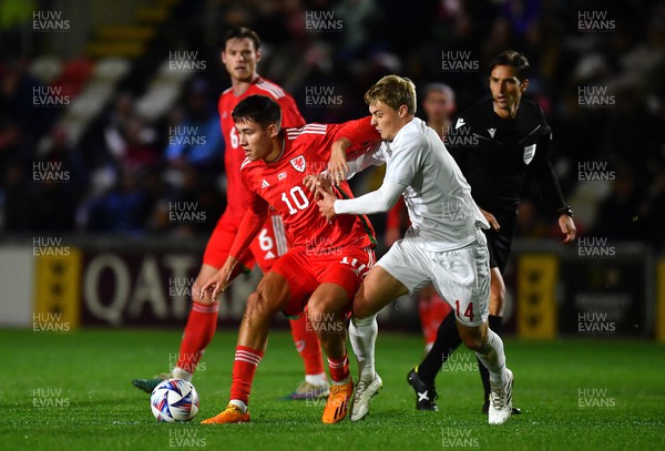 201123 - Wales U21 v Denmark U21 - European Under-21 Championship 2025 Qualifier - Rubin Colwill of Wales is tackled by David Kruse of Denmark