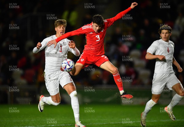 201123 - Wales U21 v Denmark U21 - European Under-21 Championship 2025 Qualifier - Owen Beck of Wales is challenged by Thomas Kristensen of Denmark