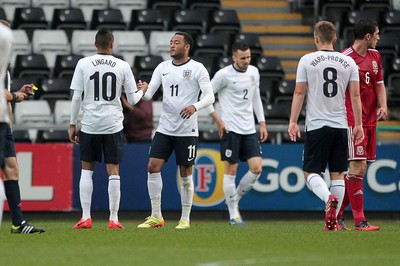 190514 - Wales U21 v England U21 - UEFA Under 21 Qualifying Match - Nathan Redmond of England is congratulated by Jesse Lingard after scoring his second goal 