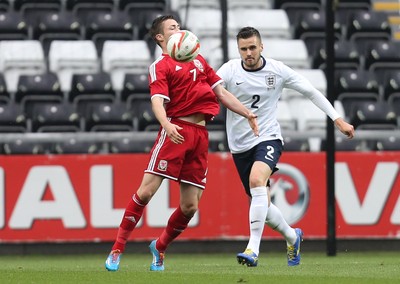 190514 - Wales v England, UEFA Under 21 Qualifying Match, Liberty Stadium, Swansea - Wales' Gwion Edwards and England's Carl Jenkinson compete for the ball