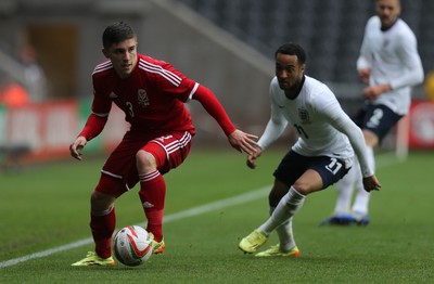 190514 - Wales v England, UEFA Under 21 Qualifying Match, Liberty Stadium, Swansea - Wales' Declan John gets away from England's Nathan Redmond