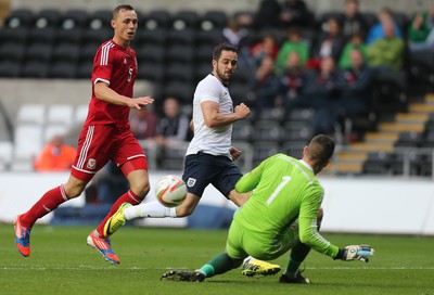 190514 - Wales v England, UEFA Under 21 Qualifying Match, Liberty Stadium, Swansea - Wales' Connor Roberts saves from England's James Ward-Prowse