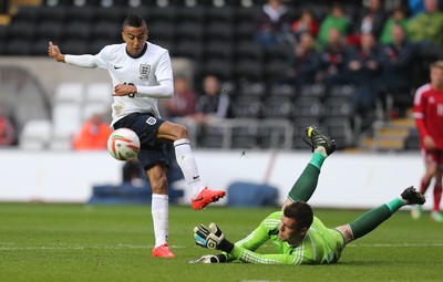 190514 - Wales v England, UEFA Under 21 Qualifying Match, Liberty Stadium, Swansea - England's Jesse Lingard sees his shot at goal blocked by Wales' Connor Roberts