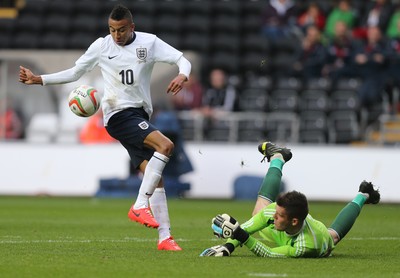 190514 - Wales v England, UEFA Under 21 Qualifying Match, Liberty Stadium, Swansea - England's Jesse Lingard sees his shot at goal blocked by Wales' Connor Roberts