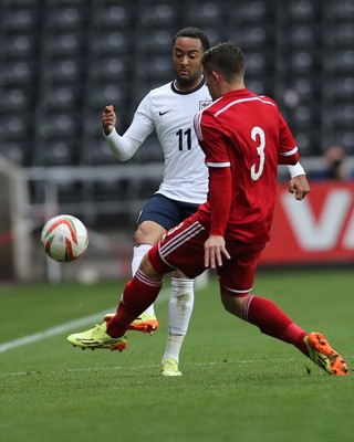190514 - Wales v England, UEFA Under 21 Qualifying Match, Liberty Stadium, Swansea - England's Nathan Redmond plays the ball past Wales' Declan John