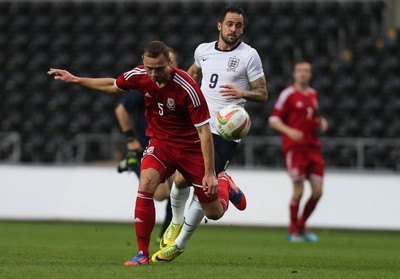 190514 - Wales v England, UEFA Under 21 Qualifying Match, Liberty Stadium, Swansea - Wales' George Ray is challenged by England's Danny Ings