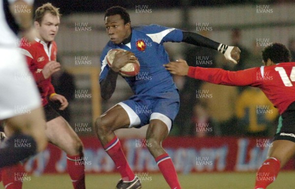 170306 - Wales U21 v France U21 - Six Nations -  Jacques Boussuge gets past Aled Brew