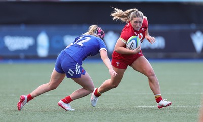 180426 - Wales U21 v France U21, Women's Under-21 Six Nations Summer Series - Freya Bell of Wales takes on Charlie Gauyat of France