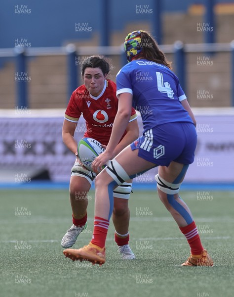 180426 - Wales U21 v France U21, Women's Under-21 Six Nations Summer Series - Lucy Isaac of Wales takes on Marine Kazmierczak of France
