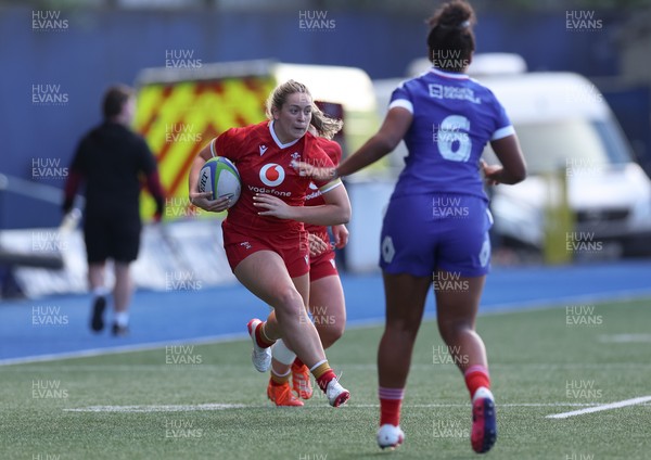 180426 - Wales U21 v France U21, Women's Under-21 Six Nations Summer Series - Freya Bell of Wales takes on Anais Peralez of France
