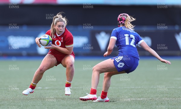 180426 - Wales U21 v France U21, Women's Under-21 Six Nations Summer Series - Freya Bell of Wales takes on Charlie Gauyat of France