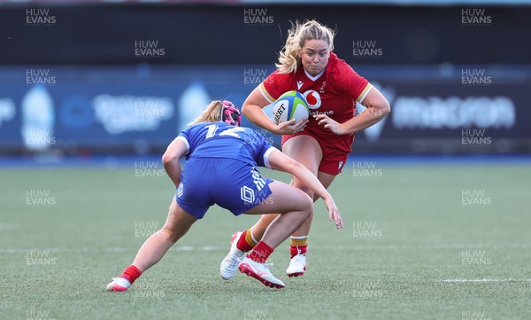 180426 - Wales U21 v France U21, Women's Under-21 Six Nations Summer Series - Freya Bell of Wales takes on Charlie Gauyat of France
