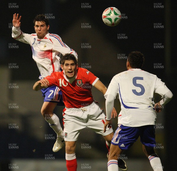 20.11.07 - Wales u21 v France u21, UEFA Under 21 Championship 2009 Qualifing, Cardiff Wales' Ched Evans wins the ball from France's Mathieu Coutadeur 