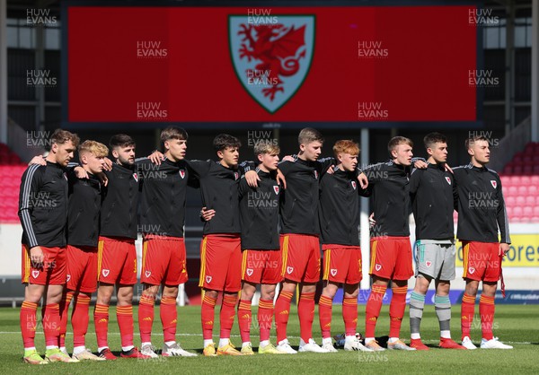 140622 - Wales U21 v Gibraltar U21, Under 21 European Championship Qualifying - The Wales team line up for the national anthem