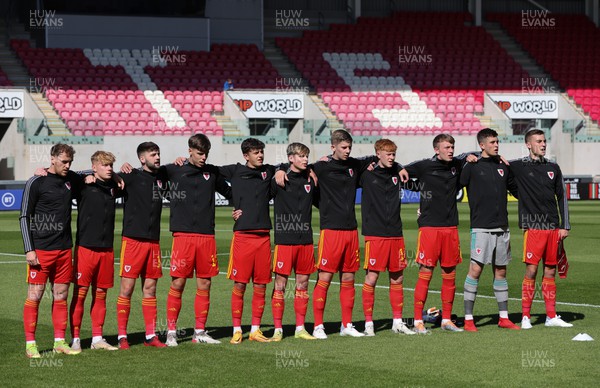 140622 - Wales U21 v Gibraltar U21, Under 21 European Championship Qualifying - The Wales team line up for the national anthem