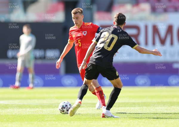 140622 - Wales U21 v Gibraltar U21, Under 21 European Championship Qualifying - Ryan Astley of Wales takes on Nicholas Pozo of Gibraltar