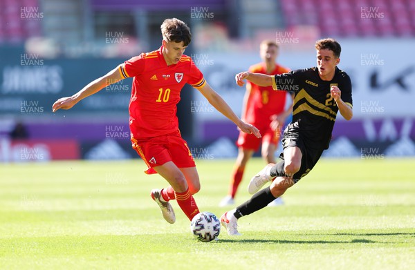 140622 - Wales U21 v Gibraltar U21, Under 21 European Championship Qualifying - Rhys Hughes of Wales takes on Nicholas Pozo of Gibraltar