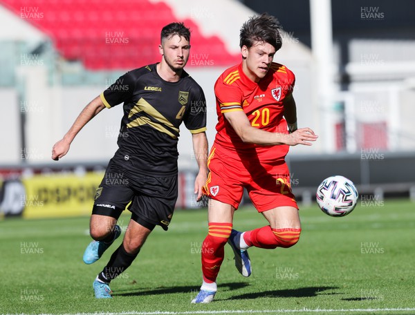 140622 - Wales U21 v Gibraltar U21, Under 21 European Championship Qualifying -Chris Popov of Wales gets away from Ethan Llambias of Gibraltar