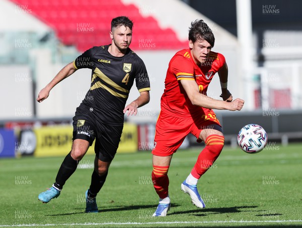 140622 - Wales U21 v Gibraltar U21, Under 21 European Championship Qualifying -Chris Popov of Wales gets away from Ethan Llambias of Gibraltar