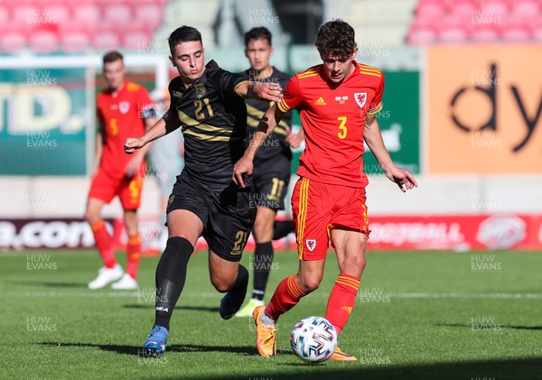140622 - Wales U21 v Gibraltar U21, Under 21 European Championship Qualifying - Owen Beck of Wales holds off Davan Martin of Gibraltar