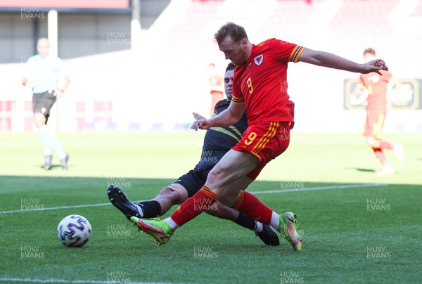 140622 - Wales U21 v Gibraltar U21, Under 21 European Championship Qualifying - Luke Jephcott of Wales is tackled by Stefan Thorne of Gibraltar