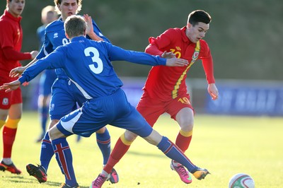 060213 - Wales v Iceland, Friendly Under 21 International, Llanelli - Wales' Tom Lawrence takes on Iceland's Hjortur Hermannsson
