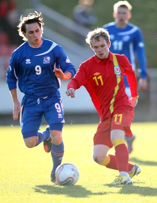 060213 - Wales v Iceland, Friendly Under 21 International, Llanelli - Wales' Jonathan Williams takes on Iceland's Oliver Sigurjonsson