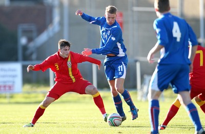 060213 - Wales v Iceland, Friendly Under 21 International, Llanelli - Wales' Kieron Freeman holds off Iceland's Kristjan Gauti Emilsson
