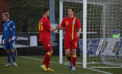 060213 - Wales v Iceland, Friendly Under 21 International, Llanelli - Wales' Robert Ogleby (rt) celebrates with Wales' Wes Burns after scoring Wales' third goal