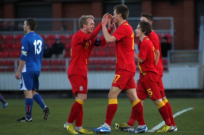 060213 - Wales v Iceland, Friendly Under 21 International, Llanelli - Wales' Robert Ogleby (rt) celebrates with Wales' Jonathan Williams after scoring Wales' third goal