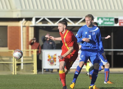 060213 - Wales v Iceland - Friendly U21 International  -  Jake Cassidy of Wales', left, shields the ball from the challenge of Iceland's Hjortur Hermannsson 