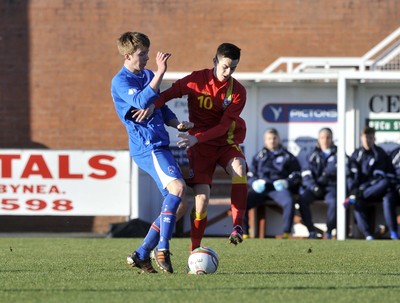 060213 - Wales v Iceland - Friendly U21 International  -  Tom Lawrence of Wales', right, is tackled by Iceland's Emil Atalson