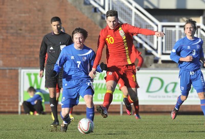 060213 - Wales v Iceland - Friendly U21 International  -  Tom Lawrence of Wales', right, is tackled by Iceland's Andri Rafn Yeoman 