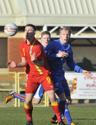 060213 - Wales v Iceland - Friendly U21 International  -  Jake Cassidy of Wales', left, shields the ball from Iceland's Hjortur Hermannsson 