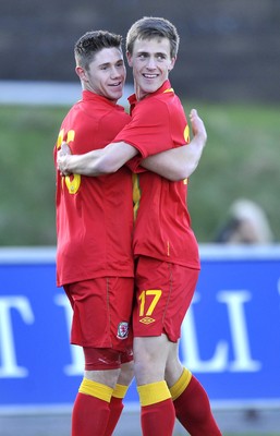 060213 - Wales v Iceland - Friendly U21 International  -  Wes Burns of Wales', left, celebrates his goal with scorer of the third goal Robert Ogleby