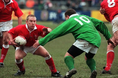 310197 - Wales U21s v Ireland U21s - Danny Hawkins of Wales takes on Emmet Farrell