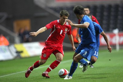 04.09.09 - Wales U21 v Italy U21, UEFA Under 21 Championship 2011 -  Wales' Aaron Ramsey challenges Italy's Lorenzo Ariaudo   