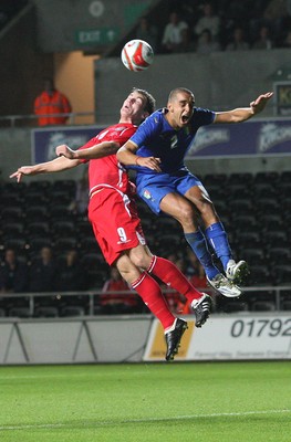 04.09.09 - Wales U21 v Italy U21, UEFA Under 21 Championship 2011 -  Wales' Sam Vokes and Italy's Giuseppe Bellusci compete for the ball 
