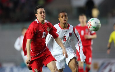 31.03.09 - Wales U21v Luxembourg U21, UEFA Under 21 Championship 2011, Llanelli -  Wales' Jonathan Brown  gets away from Luxembourg's Gerard Seisbusch   
