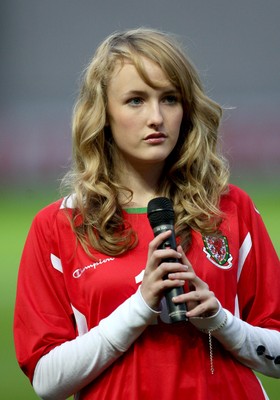 31.03.09 - Wales U21v Luxembourg U21, UEFA Under 21 Championship 2011, Llanelli -  Singer Annelies sings the Welsh National Anthem  