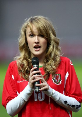 31.03.09 - Wales U21v Luxembourg U21, UEFA Under 21 Championship 2011, Llanelli -  Singer Annelies sings the Welsh National Anthem  
