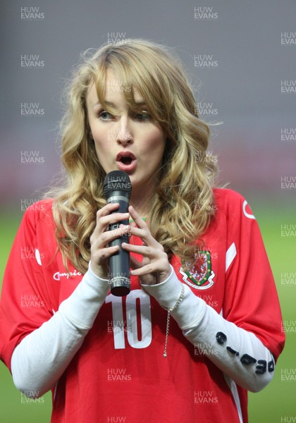 31.03.09 - Wales U21v Luxembourg U21, UEFA Under 21 Championship 2011, Llanelli -  Singer Annelies sings the Welsh National Anthem  