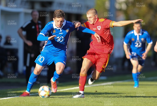040621 - Wales U21 v Moldova U21, UEFA U21 EURO 2023 Qualifying Match - Marius Iosipoi of Moldova and Ryan Stirk of Wales compete for the ball