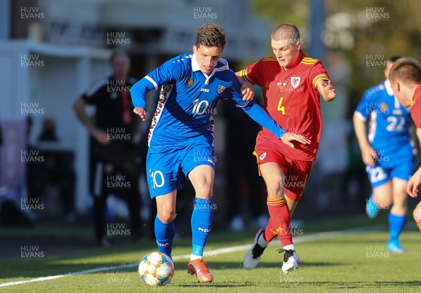 040621 - Wales U21 v Moldova U21, UEFA U21 EURO 2023 Qualifying Match - Marius Iosipoi of Moldova and Ryan Stirk of Wales compete for the ball