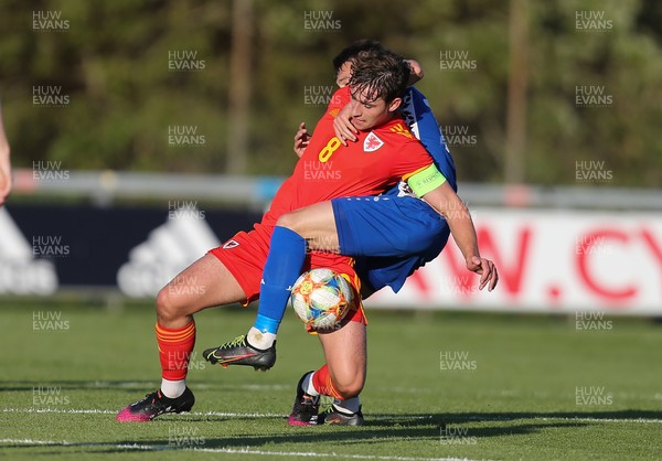 040621 - Wales U21 v Moldova U21, UEFA U21 EURO 2023 Qualifying Match - Terrence Taylor of Wales is tackled by Nichita Motpan of Moldova