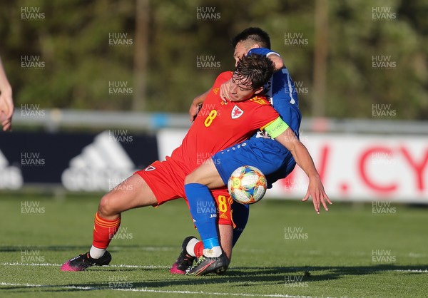 040621 - Wales U21 v Moldova U21, UEFA U21 EURO 2023 Qualifying Match - Terrence Taylor of Wales is tackled by Nichita Motpan of Moldova