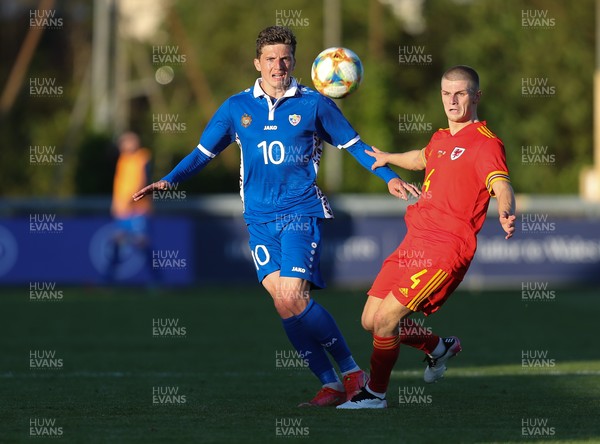 040621 - Wales U21 v Moldova U21, UEFA U21 EURO 2023 Qualifying Match - Ryan Stirk of Wales and Marius Iosipoi of Moldova compete for the ball