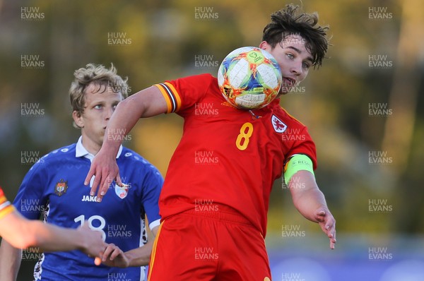 040621 - Wales U21 v Moldova U21, UEFA U21 EURO 2023 Qualifying Match - Terrence Taylor of Wales and Seraphim Cojocari of Moldova compete for the ball