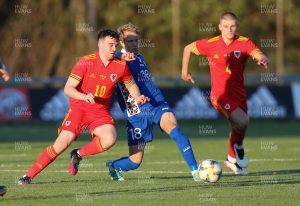040621 - Wales U21 v Moldova U21, UEFA U21 EURO 2023 Qualifying Match - Sion Spence of Wales and Seraphim Cojocari of Moldova compete for the ball